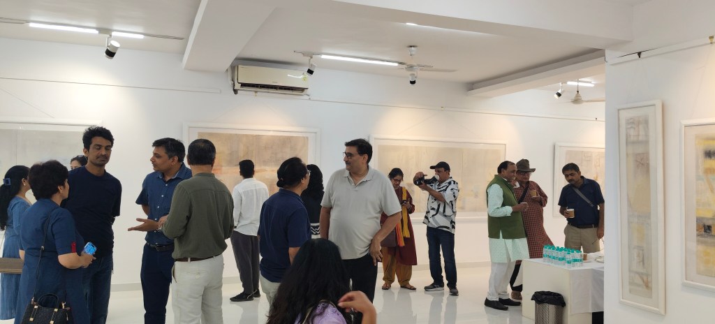 A busy art gallery scene with several people engaged in conversation, admiring artworks, and interacting with each other in a bright, airy space.