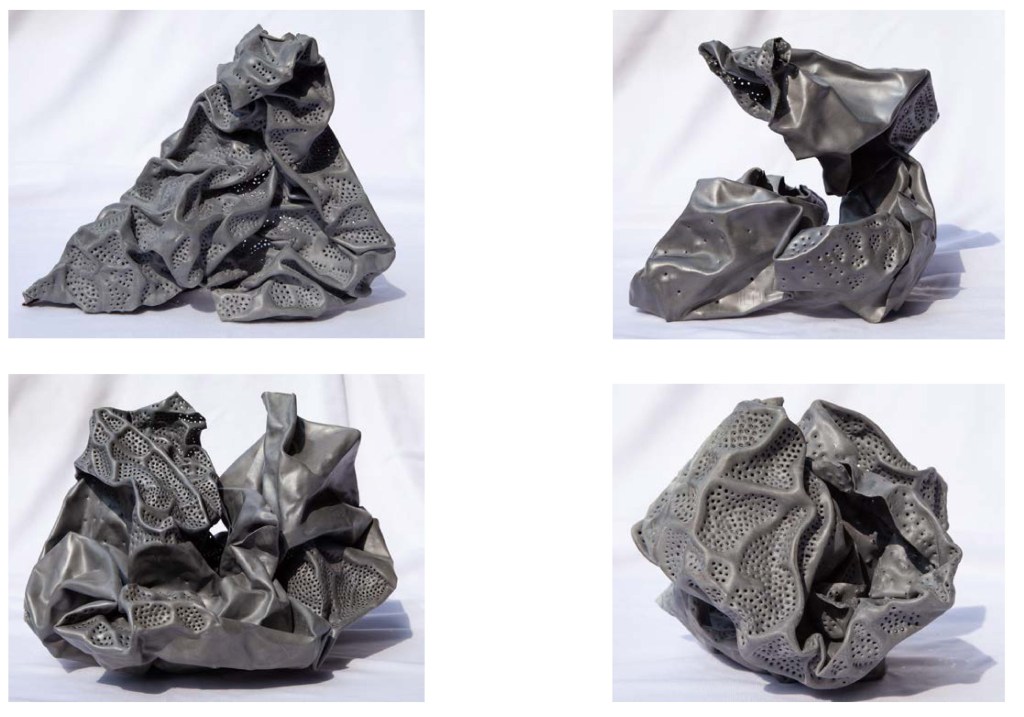 Four abstract sculptures made of gray material, featuring crumpled textures and intricate perforations, displayed on a white background.